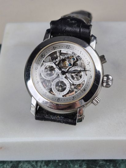 ANDRE BELFORT.
Metal skeleton dress watch...