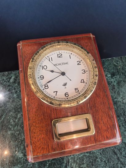 MEMO TIME
Mahogany and gilt metal marine-style...