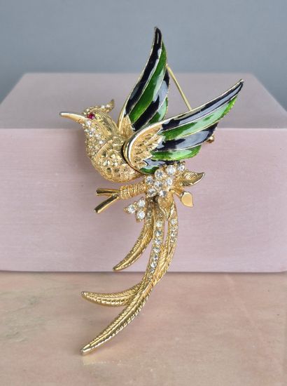Broche oiseau aux ailes déployées en métal...