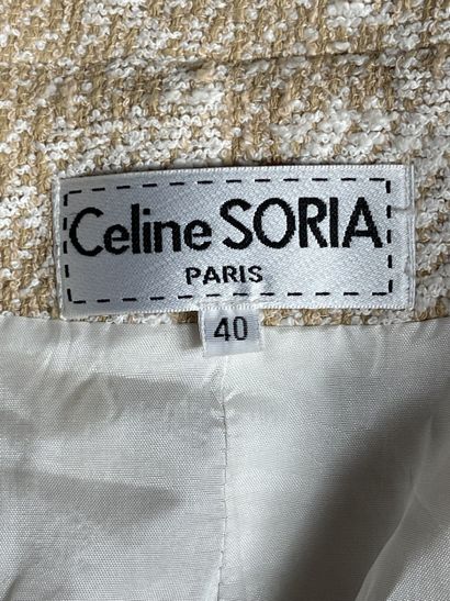 Celine SORIA
Veste en tweed beige et blanc...