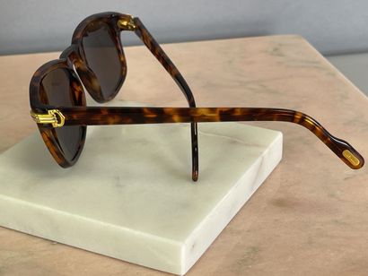 CARTIER
Paire de lunettes de soleil dans...