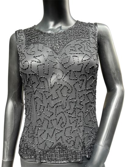 L'indiez
Haut en sequins et perles transparent...