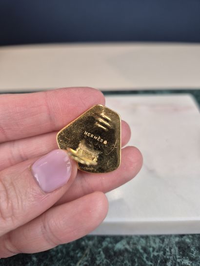 HERMES
Half set of enamelled gilt metal with...