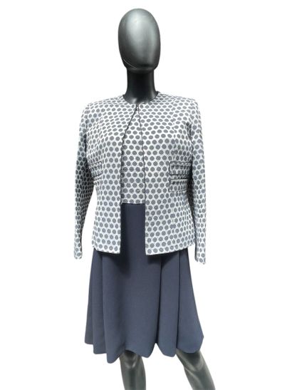 Celine SORIA 
Robe à poids bleus et blanche.
Taille...