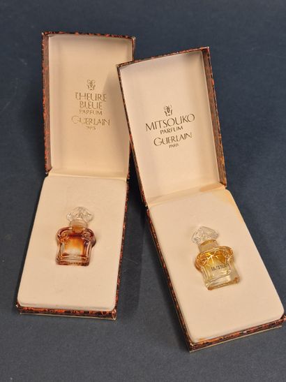 GUERLAIN
Deux coffrets comprenant deux petits...