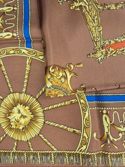 CELINE
Printed silk square decorated with...