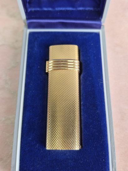 Christian DIOR 
Gold-plated guilloché lighter....