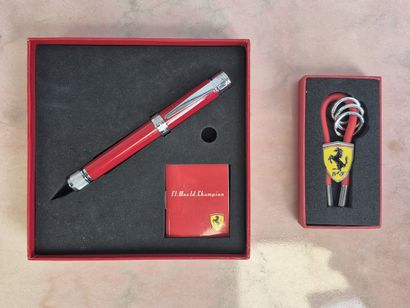 FERRARI
Lot including : 
- a guilloched metal...