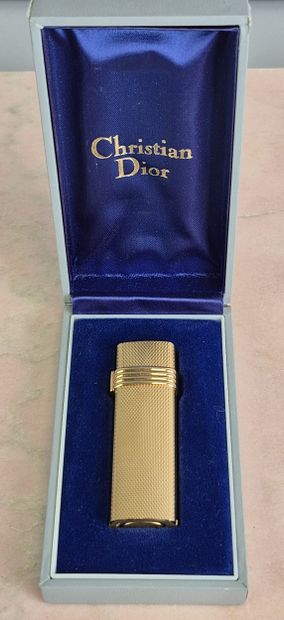 Christian DIOR 
Gold-plated guilloché lighter....