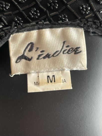 L'indiez
Haut en sequins et perles transparent...