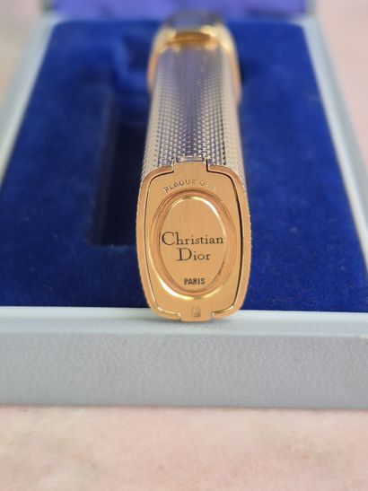 Christian DIOR 
Gold-plated guilloché lighter....