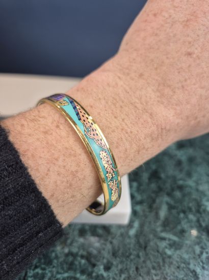HERMES
Half set of enamelled gilt metal with...