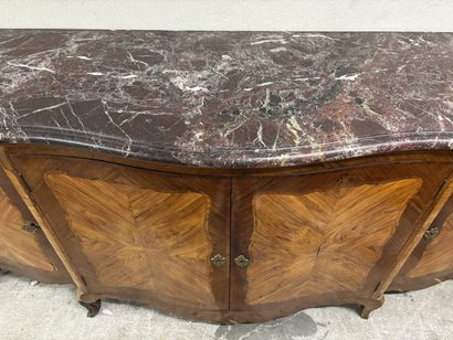 A large enfilade in veneered wood and frieze...