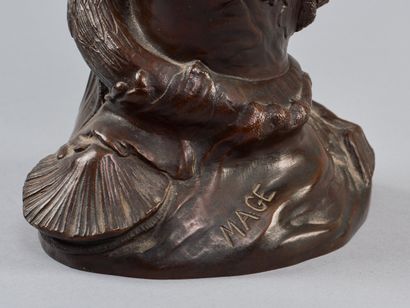 A bronze vase with a medallic patina, flared...