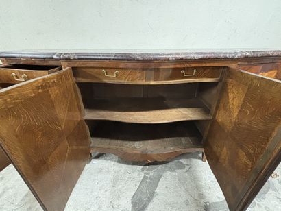 A large enfilade in veneered wood and frieze...
