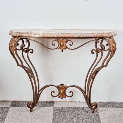 Partially gilded wrought-iron console table...
