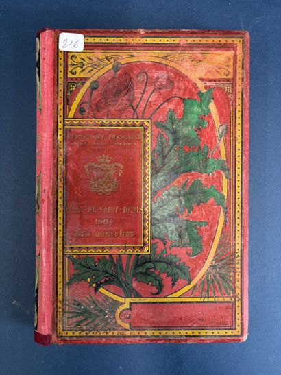 Un livre couverture cartonnée rouge « Le...