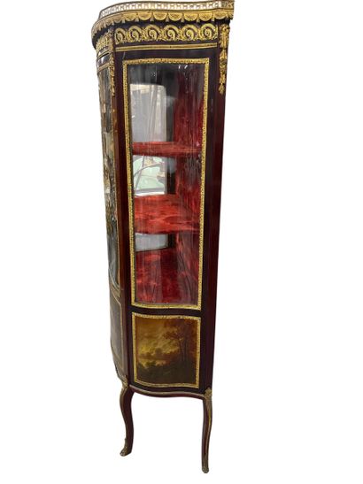 Veneered wood and gilt bronze display case...
