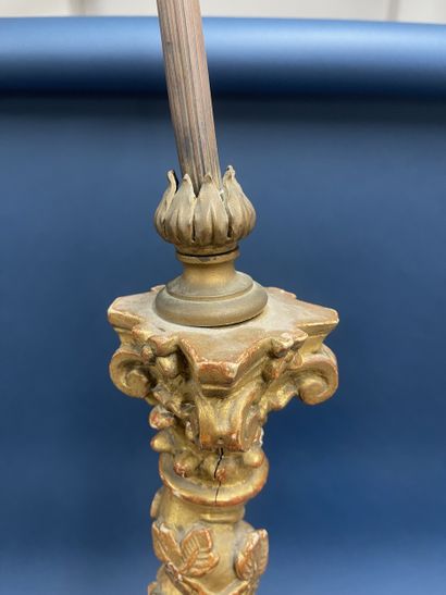 Carved and gilded wood pique-cierge with...
