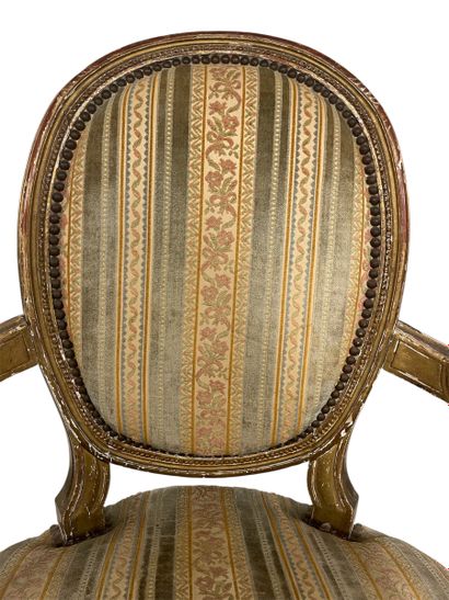 Gilded carved wood cabriolet armchair with...