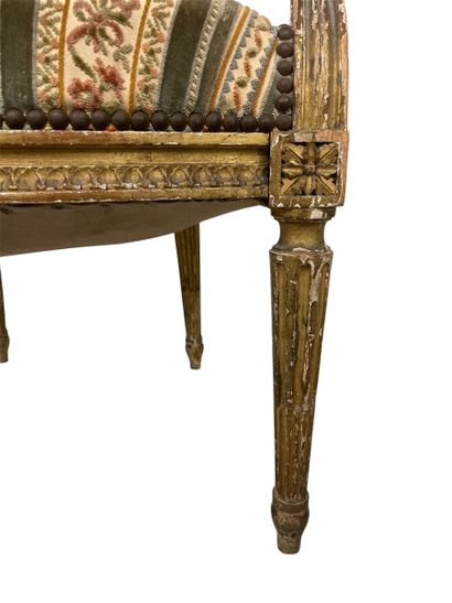 Gilded carved wood cabriolet armchair with...