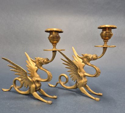 Pair of gilded bronze candlesticks featuring...