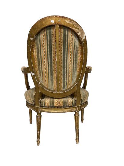 Gilded carved wood cabriolet armchair with...