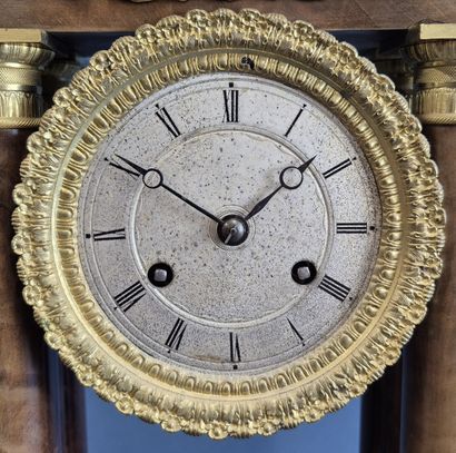 Portico clock in veneered wood resting on...