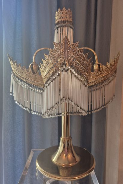 Gilded metal lamp with four arms terminating...