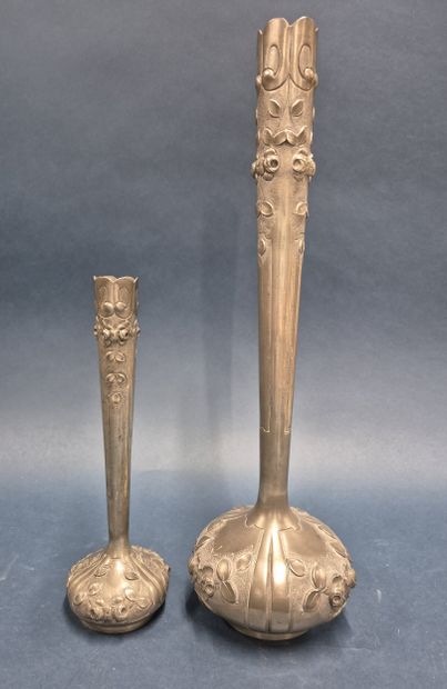 Two pewter soliflor vases decorated with...