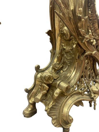 Gilt bronze mantel set including a rocaille...