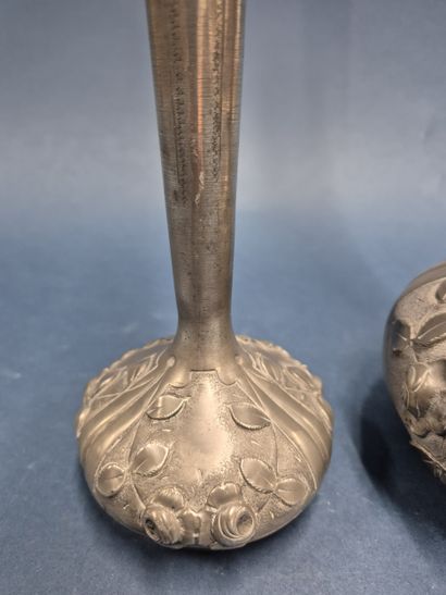 Two pewter soliflor vases decorated with...