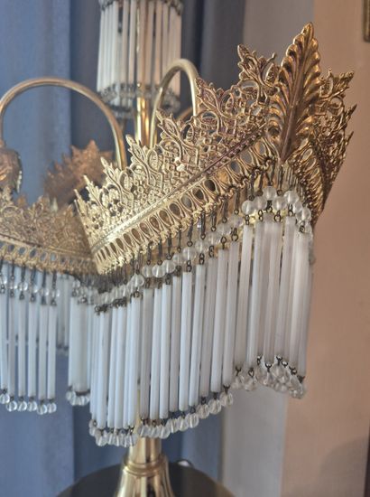 Gilded metal lamp with four arms terminating...