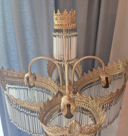 Gilded metal lamp with four arms terminating...