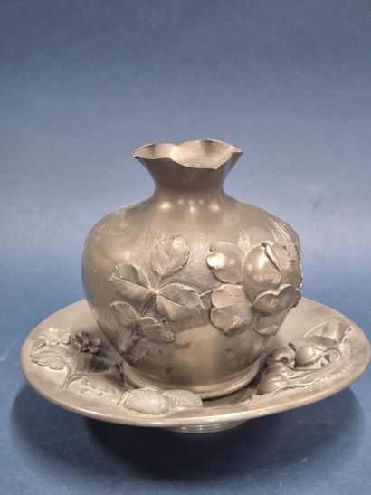 PREVOT
Lot comprising an ovoid pewter vase...