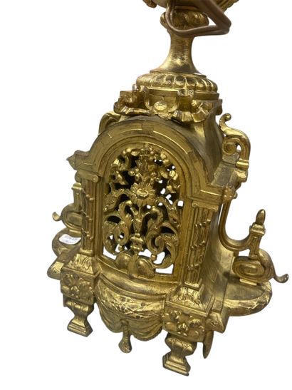 Gilt bronze mantel set including a rocaille...