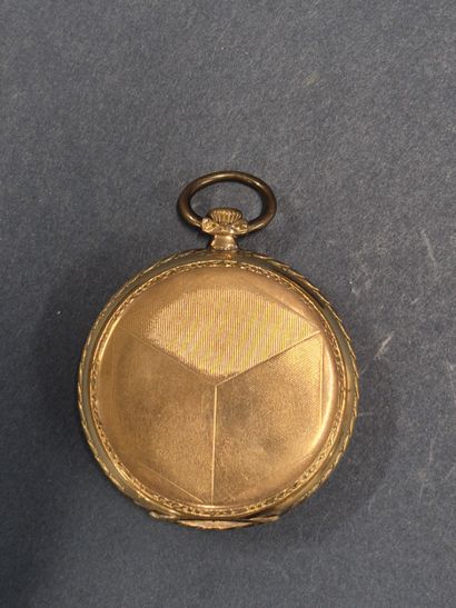 Montre à gousset en plaqué or dans un porte...