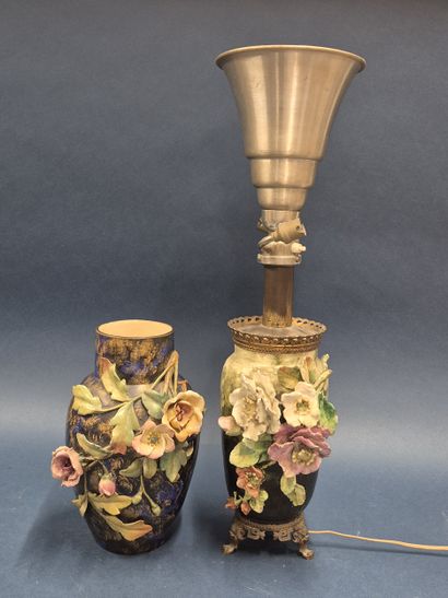 Reunion of two barbotine vases with flowers...