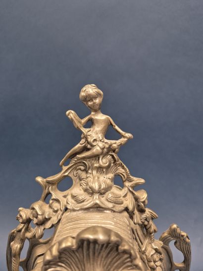Pewter cartel with rocaille decoration topped...