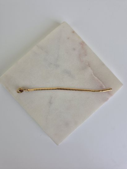 Débris d'or formée d'une partie de bracelet...
