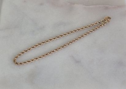 Bracelet en or jaune 18k 750 millièmes torsadé....