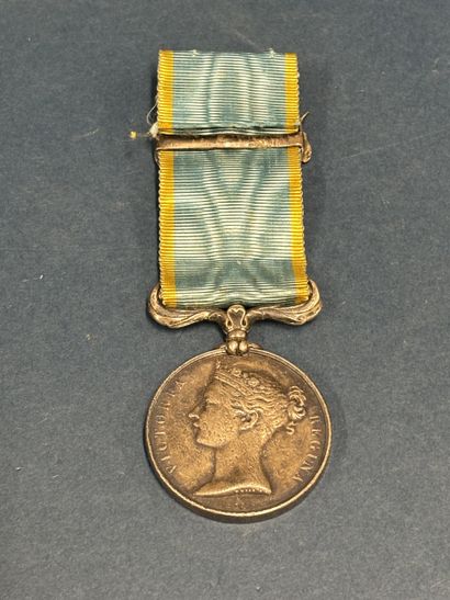 Crimea medal. 
Unmarked edge, with its ribbon...