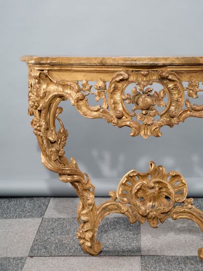 Carved and gilded wood console table with...