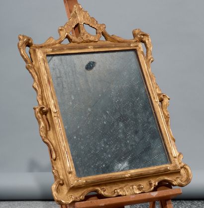 Small rectangular mirror in wood and molded...