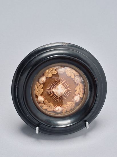 Reliquary with paperolles. 19th century....