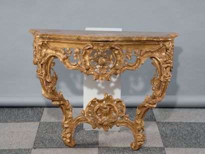 Carved and gilded wood console table with...