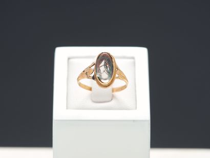 Bague souvenir en or jaune 18k 750 millième,...