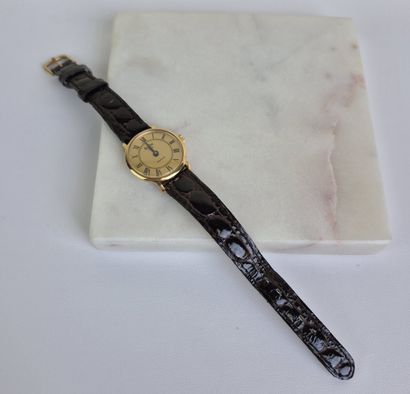 QUILBE 
Montre bracelet de dame en plaqué...