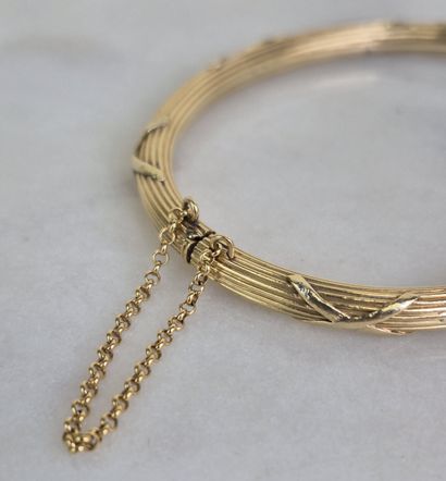 Bracelet jonc ouvrant en or jaune 18k 750...