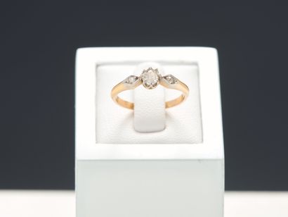 Bague en or jaune 18k 750 millièmes et platine...